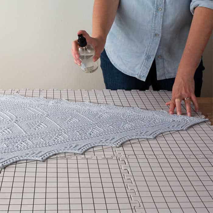 Spray blocking a shawl. Photo credit: Knit Picks