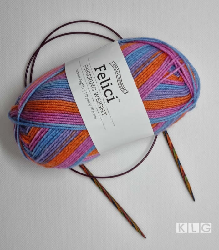 Felici Sock Yarn in orange blue purple and pink stripes