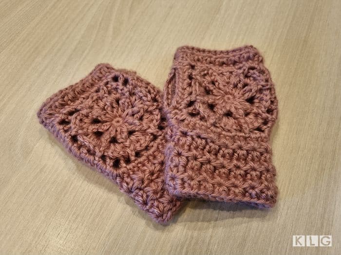 Farrah from The Crochet Fix own design for crocheted mittens in rose pink colored yarn