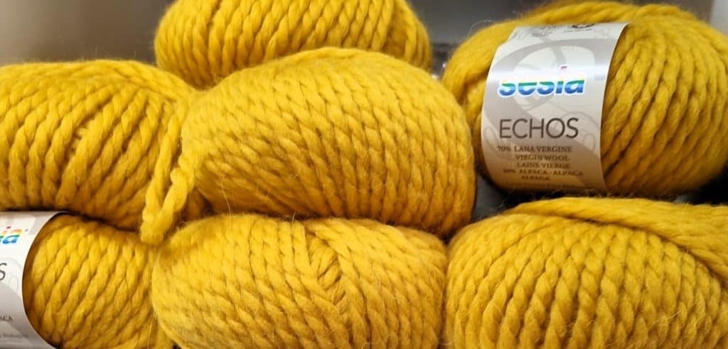 Super bulky weight balls of yellow yarn
